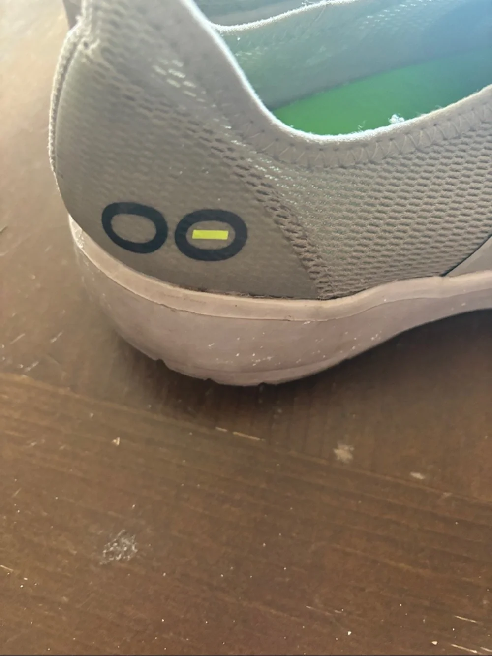OOFOS Women's oomg eezz  recovery slide ons in Gray with Lime Accents